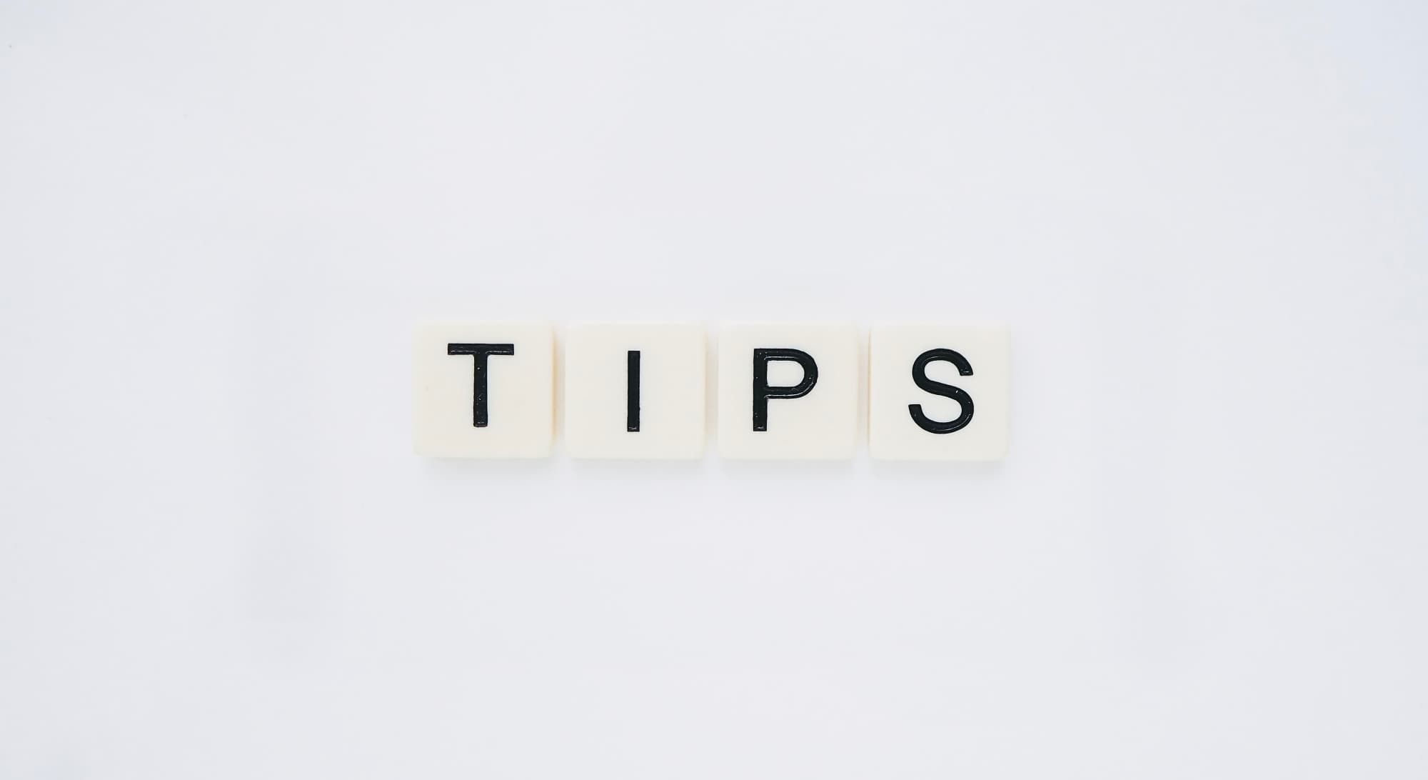 Scrabble letters spelling the word Tips