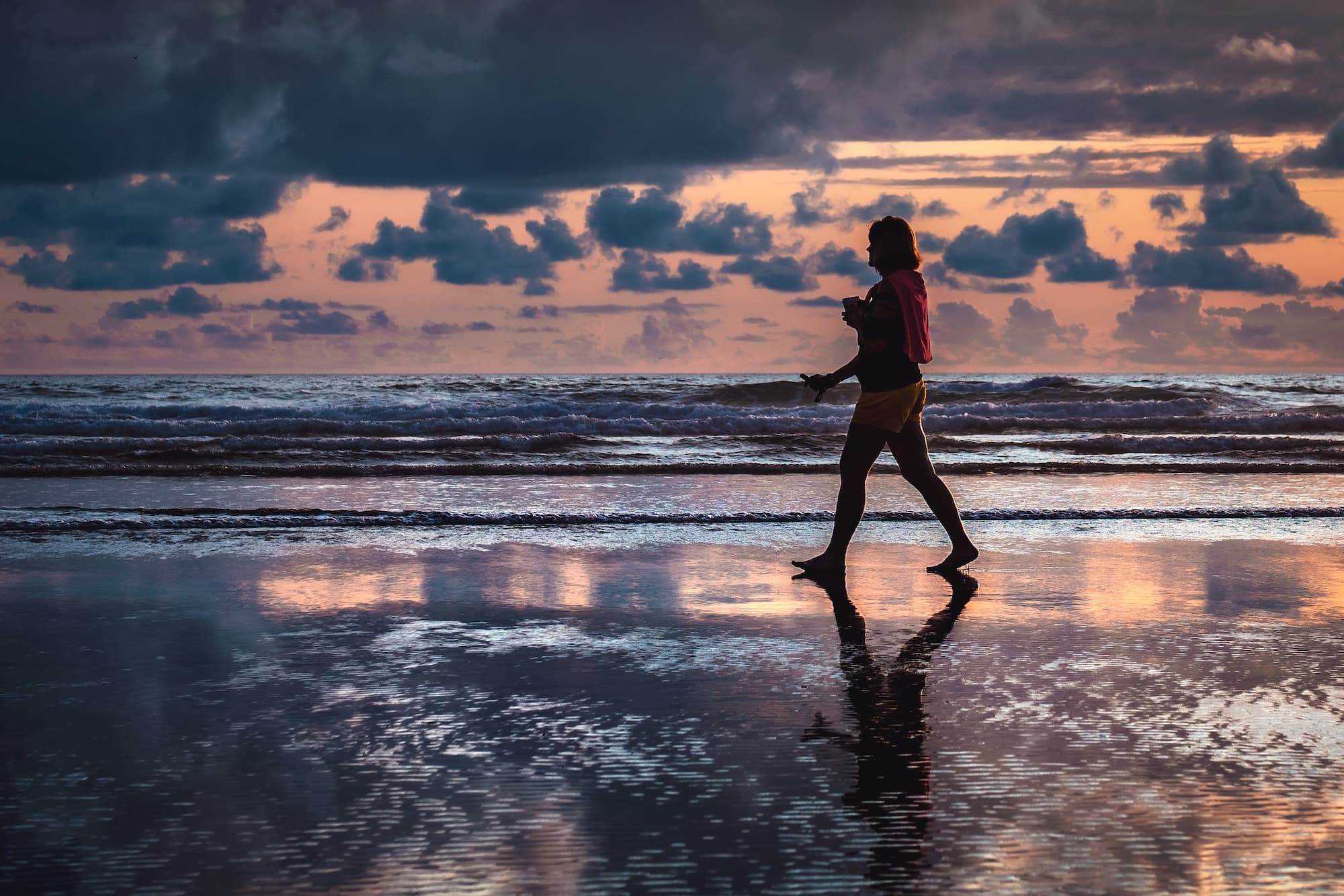 Person walking on the beach