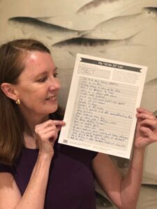Gretchen holding her "22 in 2022" list