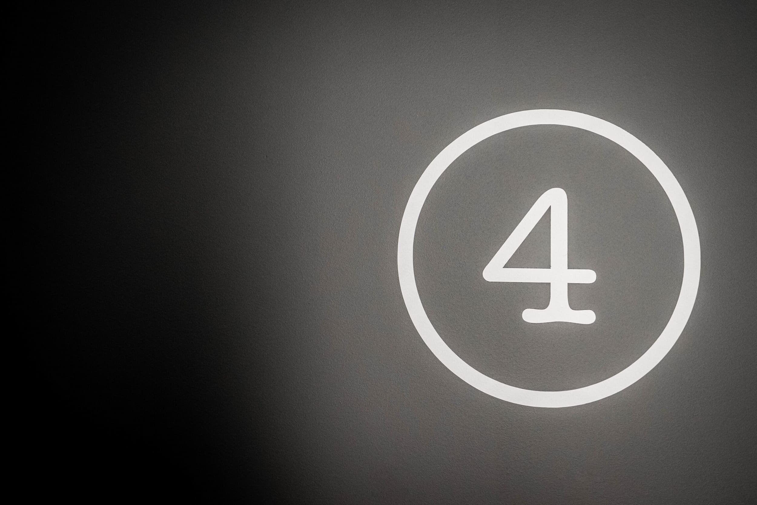 Photo of white neon number 4